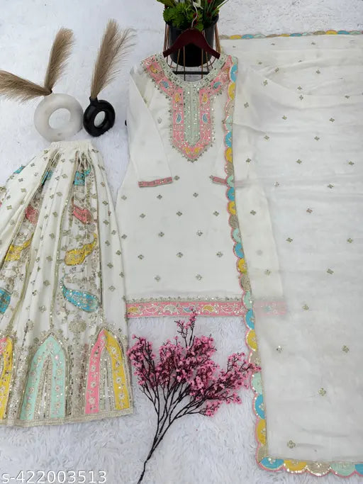 Chiffon party wear top, dupatta, and Sharara with Malty thread embroidery and lace border. Heavy silk from Fashion India for fancy events