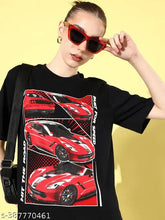 Women's black graphic oversized cotton t-shirt, short sleeves, printed net pattern, pairs well with denim - India origin