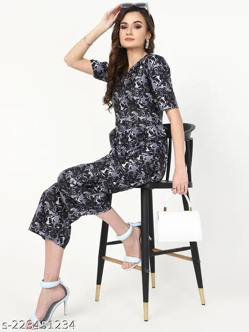 Trendy crepe jumpsuit with printed net pattern for women, three-quarter sleeves, sizes S-L. Made in India