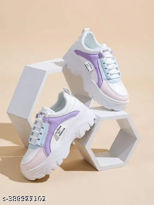 Multi-color mesh sneakers for women and kids, featuring lace-up fastening and solid rubber soles. Stylish footwear designed with durability in mind for the latest trends