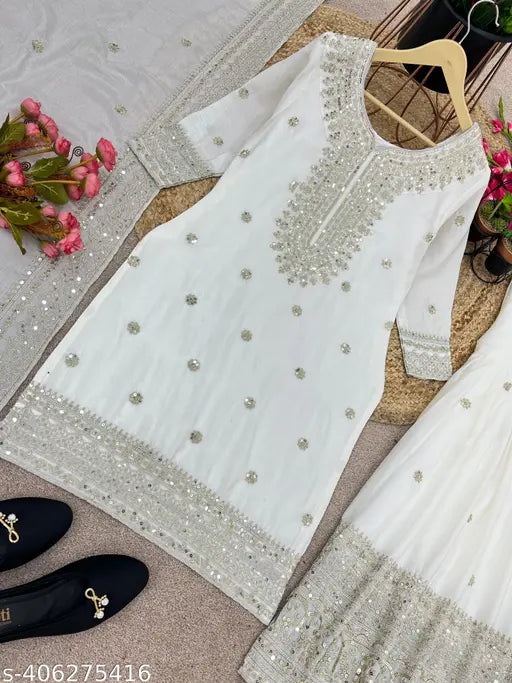White silk Chinon replika sharar Kurta with dupatta and bottomwear, embroidered sequin work, three-quarter sleeves. Inner: heavy micro cotton. Ready-to-wear. Gharara in pure Chinnon silk with elastic, full stitched. Dupatta in pure Chinnon silk with lace border. Indian origin