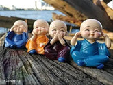 Poly resin baby monk figurines set, intricate Fancy Idols from India, 4 pieces: 1.5x0.5x0.5cm each
