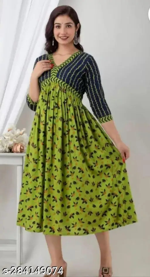 Rayon green middi gown/kurti for women, three-quarter sleeves, printed; classic, trendy, comfortable outfit for events; Made in India