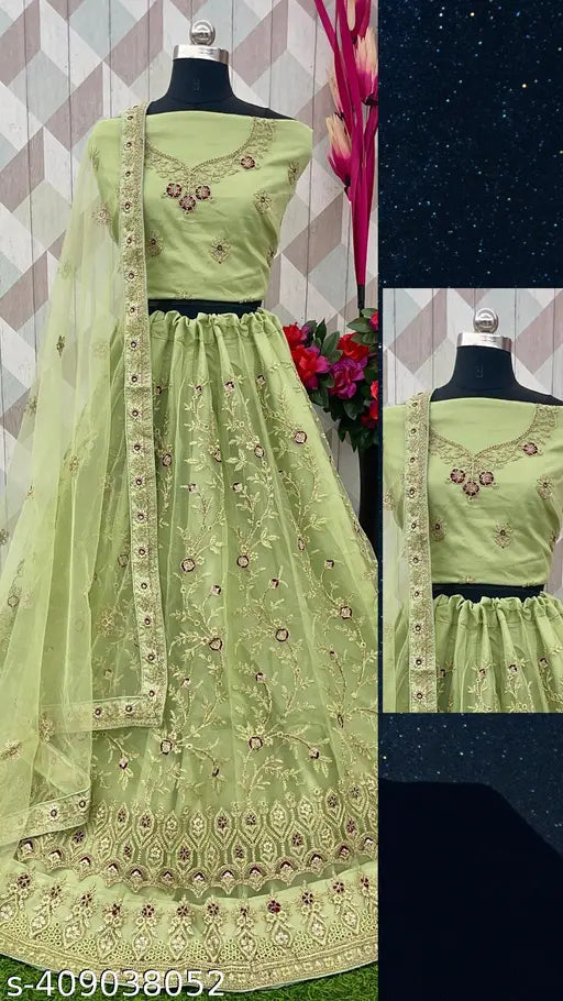 Heavy embroidered work wedding lehenga choli, net fabric with matching dupatta and blouse, embellished Indian bridal attire on display