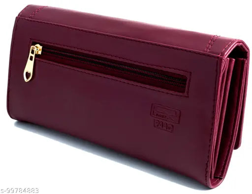 Maroon faux leather women's and girls clutch wallet with magnetic closure, 5 compartments for cards, mobile, makeup, passport, and more. Lightweight, easy to carry, trending design. Synthetic leather for longevity and easy maintenance. Indian origin
