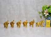 Gold metal Indian elephant figurine set (6pcs, 8cmL x 6.5cmH x 4cmW), symbolizing wisdom and power for home decor