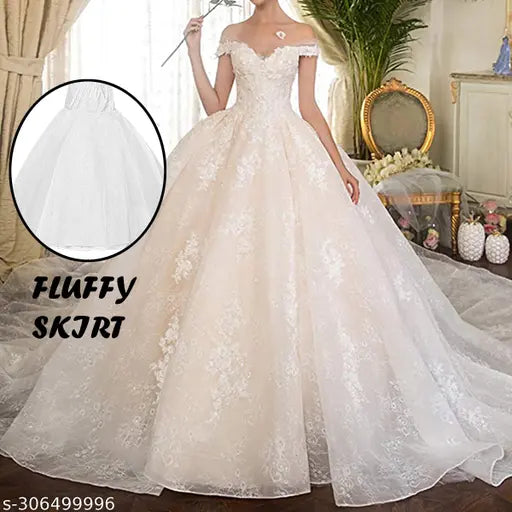 White nylon and organza hoopskirt for ball gowns and Lehengas, featuring one steel hoop, two layers of tulle with lace hem. Adjustable elastic waist for easy use. Height approximately 35.43 inches, diameter 31.5 inches. Includes one crinoline petticoat. Made in India