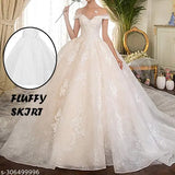 White nylon and organza hoopskirt for ball gowns and Lehengas, featuring one steel hoop, two layers of tulle with lace hem. Adjustable elastic waist for easy use. Height approximately 35.43 inches, diameter 31.5 inches. Includes one crinoline petticoat. Made in India