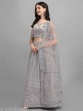 Trendy women's semi-stitched net lehenga choli and dupatta with embroidered patterns, India origin