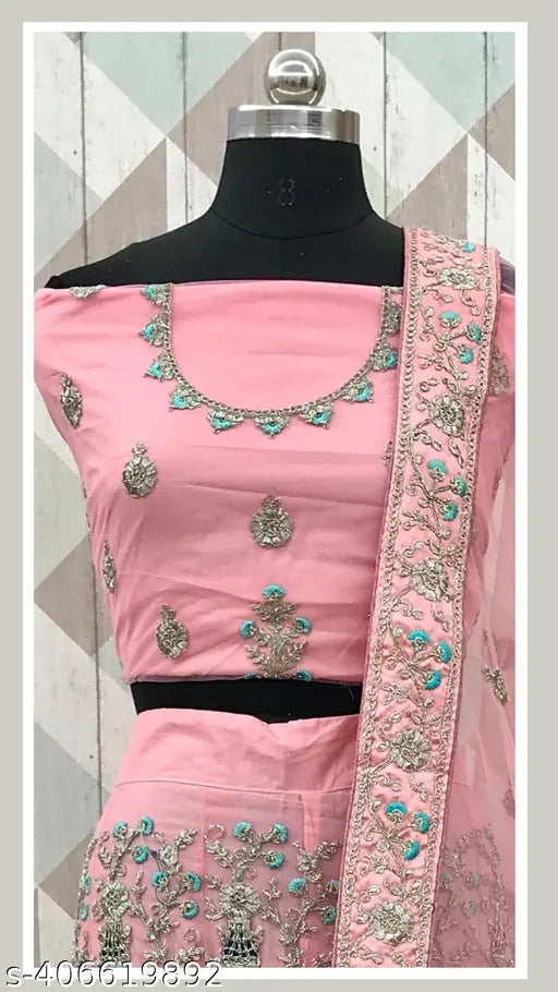 Heavy pink net embroidered Lehenga Choli with Semi-Stitched Blouse and Dupatta. Perfect for festive occasions. Indian designer ethnic wear for normal and special events
