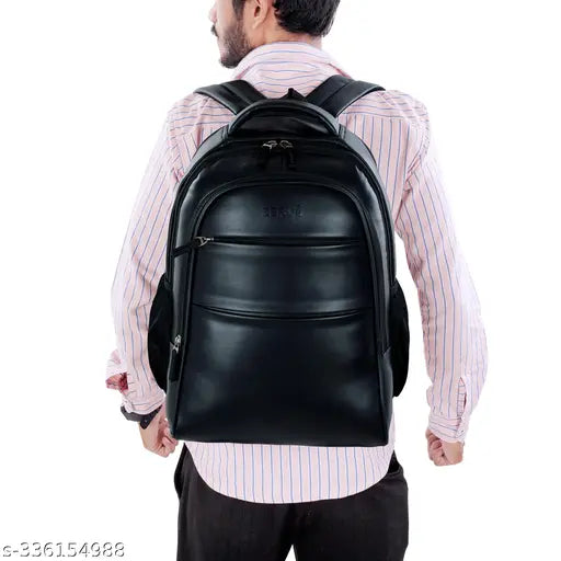 Premium black vegan leather 40L laptop backpack, perfect for men's and women's office travel or school use. Durable, water-resistant, and equipped with adjustable shoulder straps for comfort