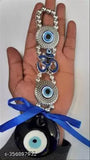 Blue plastic om evil eye wall hanging, 18.5cm x 5cm, for Feng Shui and good luck decor