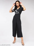 Women's polyester snake print overlap jumpsuit with short sleeves, featuring a unique overlap design and bold side yoke, available in sizes XS-XL from India
