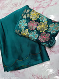 Georgette designer Rangoli aari border saree with sequin blouse, vibrant printed pattern on display
