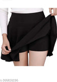 Cotton blend mini skirt with attached inner shorts, flared style for women in solid colors. High-quality, stretchy, and comfortable for various occasions like casual, party, office, or weddings. Available sizes: 26, 28, 30, 32, 34, and 36 inches. Made in India