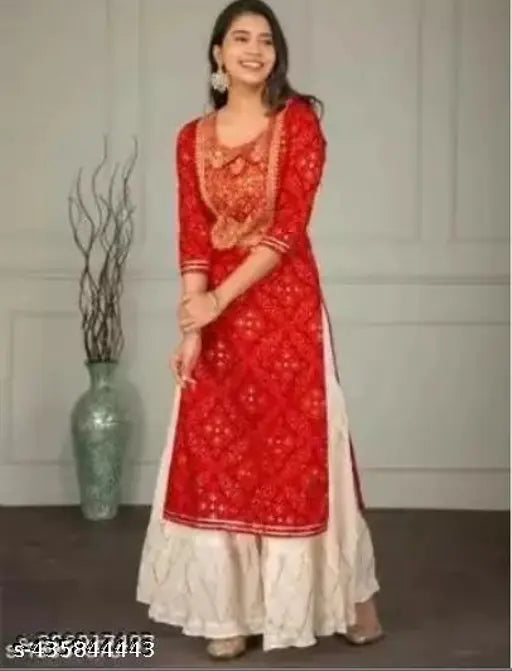 Red rayon kurta and white sharara set, printed net three-quarter sleeves, palazzos style