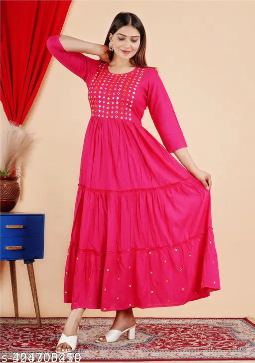Embellished rayon embroidered kurta by Rani 666. Traditional Indian Anarkali gown with three-quarter sleeves, suitable for functions, festivals, and weddings. Lightweight and comfortable. Made in India