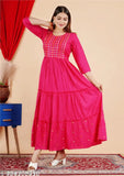 Embellished rayon embroidered kurta by Rani 666. Traditional Indian Anarkali gown with three-quarter sleeves, suitable for functions, festivals, and weddings. Lightweight and comfortable. Made in India