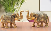 Gold-polished, handcrafted Indian elephant statues for decorative showpiece, symbolizing good luck and wisdom