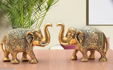 Gold-polished medium size handcrafted Indian elephant statues, luxury home decor for office tables or display areas, symbolizing wisdom, strength, and good luck