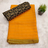 Yellow Georgette saree with separate Italian silk blouse piece, gold foil embellished and trending print pattern