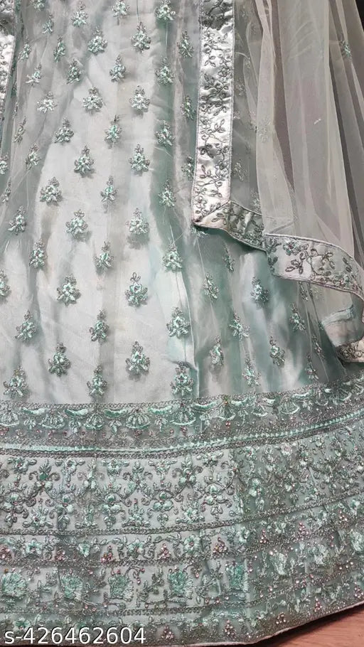 Heavy diamond-work lehenga, choli, and dupatta set in free size (43in waist, 42in length, 70in dupatta), embroidered with zari on net fabric. Perfect for casual or formal occasions