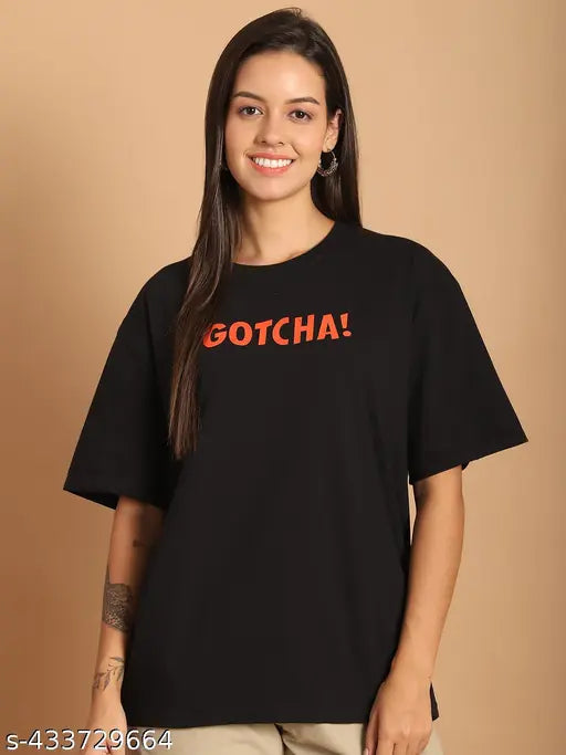 Black cotton oversize women's graphic print t-shirt with half sleeves and loose fit, featuring vibrant prints on front and back