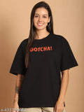 Black cotton oversize women's graphic print t-shirt with half sleeves and loose fit, featuring vibrant prints on front and back