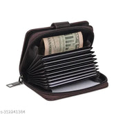 Brown faux leather RFID card holder wallet with 8 card slots, 2 cash compartments, and 9 extra slots for daily use. Compact size of 11.5x9x3cm fits easily into handbags or coats pockets. Ideal for personal use or gift-giving, originating from India