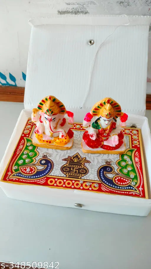 Handmade Meenakari Marble Ganesha Idol 14.5cm x 2.5cm x 9.5cm, intricately decorated Indian handcrafted figurine