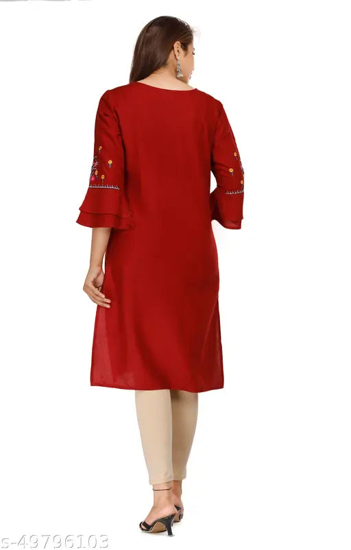 Maroon Rayon Embroidered Kurti, 3/4 sleeves, straight cut for women's casual or office wear. Breathable and comfortable, Made in India." (107 characters)