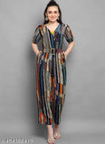 Multicolor striped rayon foil printed round neck jumpsuit with three-quarter sleeves, featuring square neck design, flat pleat waist, two side pockets, and belt buckle. Ideal for casual wear, parties, and special occasions. Crafted in India