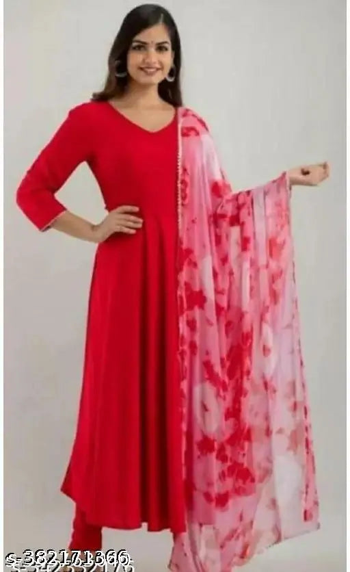 Rayon Anarkali printed kurta with dupatta for women and girls in solid pattern, three-quarter sleeves. Indian ethnic wear on display." (125 characters)