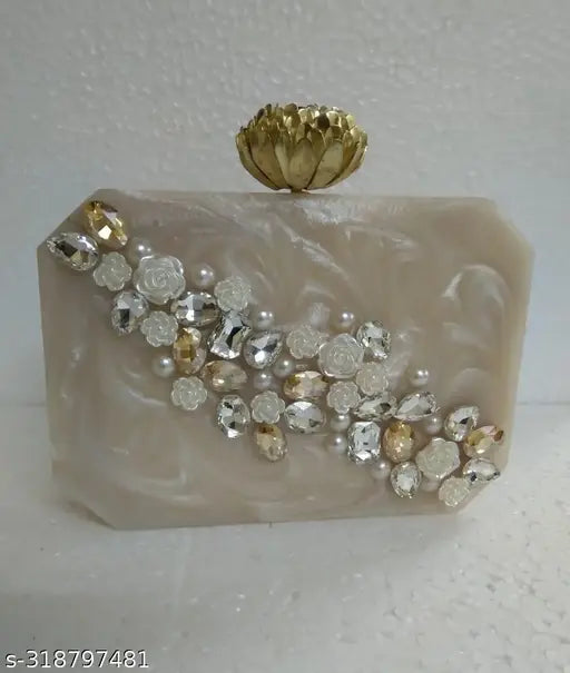 Resin, unique pattern handmade clutch bag for women. Designer handbag with tap lock closure, embellished net finish. Ideal for bridal, casual, party wear." (105 characters)