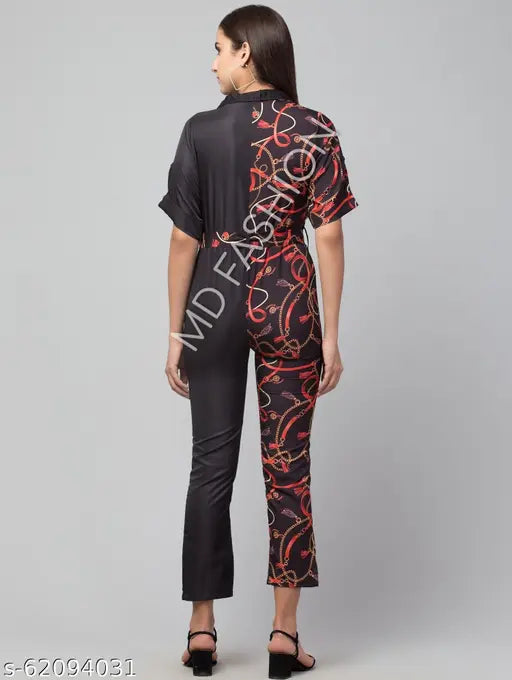 Dual-tone poly crepe printed jumpsuit with short sleeves, ideal for fashion-forward women. Colors vary from heart and love print design. Made in India