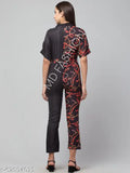 Dual-tone poly crepe printed jumpsuit with short sleeves, ideal for fashion-forward women. Colors vary from heart and love print design. Made in India