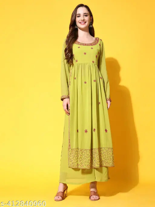 Georgette A-line kurta with round neck, full sleeves and straight hem, paired with ankle-length sharara with elasticated waistband. Embroidered net Georgette set for women, India origin