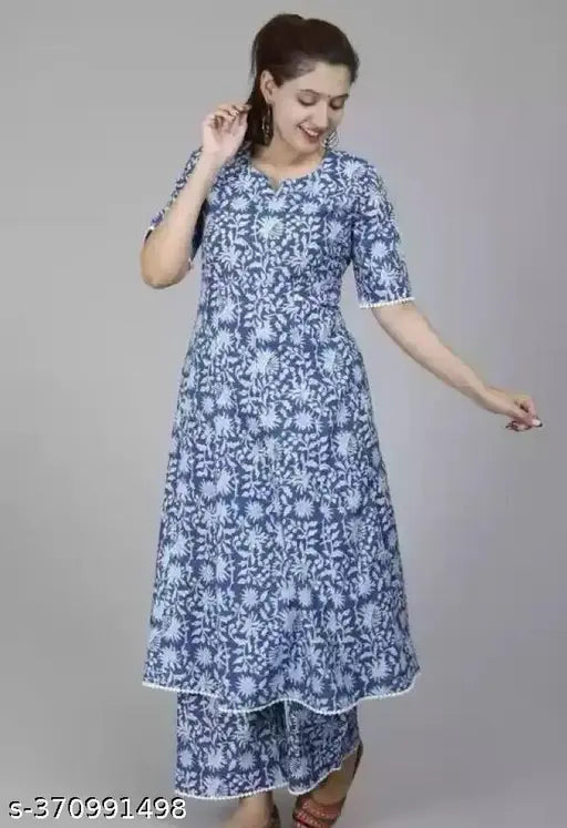 Rayon kurti with plazo, printed net design, three-quarter sleeves on a display stand, heavy rayon fabric, Indian origin