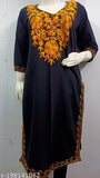Black woolen kurti with yellow Kashmiri embroidery, three-quarter sleeves. Indo-western women's fashion wear for day, casual, or wedding occasions. Handcrafted in India
