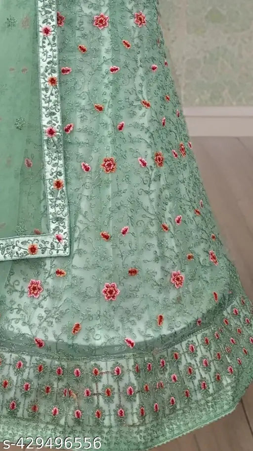 Sea green net lehenga, choli, blouse set with embroidered dupatta. Handcrafted Indian bridal wear for festivals and parties