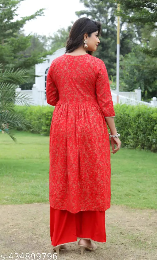 Designer rayon printed embroidery Nyra cut kurti and palazzos, three-quarter sleeves, Indian handcrafted fashion on display