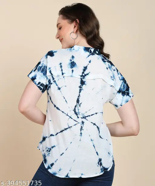 Tie-dye printed rayon women's top in vibrant saffron orange, half sleeves, fitted style