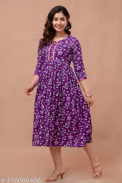 Purple printed anarkali kurta in rayon-cotton, perfect for women's daily or party wear. Graceful anarkali silhouette, elegant purple hue, and available in multiple sizes
