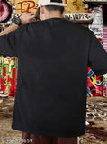 Black cotton graphic printed oversized Manlino men's t-shirt, perfect for everyday wear with a smile print on back