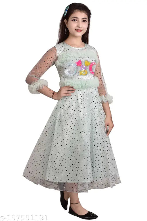 Stylish fancy net frock (3-4 years), embellished with three-quarter sleeves, super net material, size 32in x 22in. Indian handcrafted girl's dress on mannequin