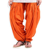 Orange solid cotton Patiala for casual & party wear, machine-washable