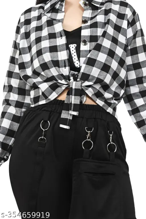 Black and white checkered jacket with black pants and multiple chains, girl's casual outfit