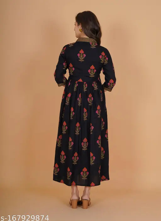 Indianic Women's Black Rayon Floral Gold Print Flared Kurta with 3/4th sleeves and V-neck, available in various sizes from XS to XXXL. Comfortable rayon fabric perfect for everyday wear. Stylish design makes it an ideal choice for any occasion