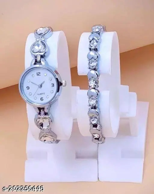 Silver watch bracelet with clear beads and analog display