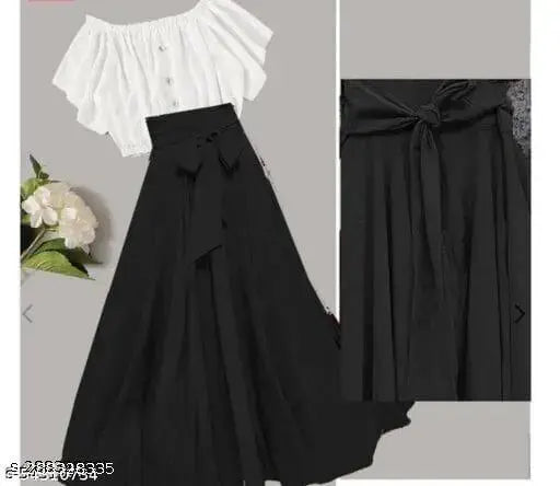 Long skirt with ruffled trim, sleeveless top in white, black waistband